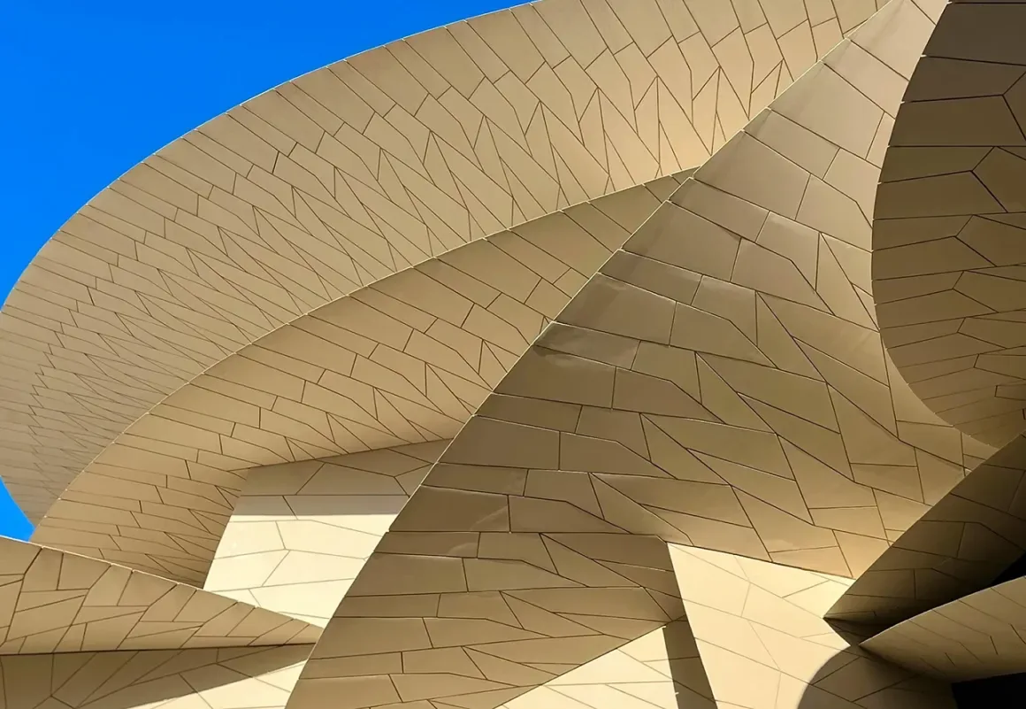 Curved sand-coloured desert-rose architecture in Doha, Qatar