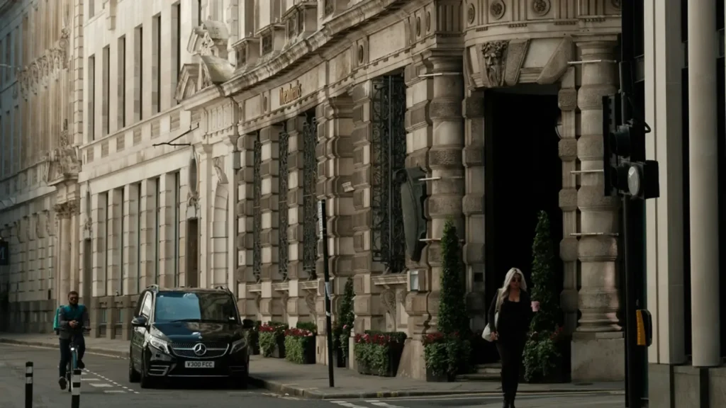 London street with a black taxi