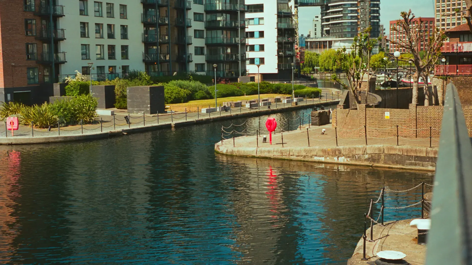 Modern waterside apartment buildings by a canal